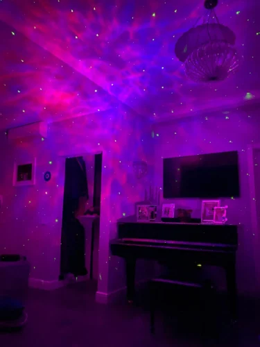 CosmicDream Galaxy Star Projector LED Night Light: Astronaut Lamp for Bedroom Decoration photo review