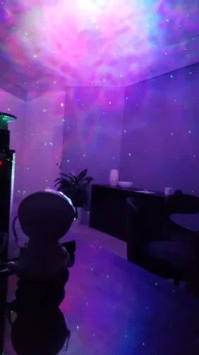 CosmicDream Galaxy Star Projector LED Night Light: Astronaut Lamp for Bedroom Decoration photo review